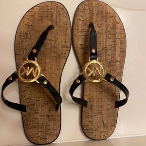 Michael Kor’s woman’s flip flops size 8.5